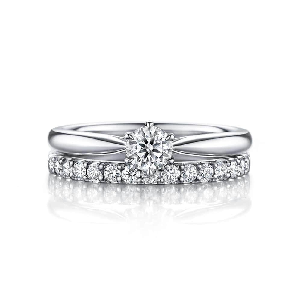 婚約・結婚指輪のI-PRIMO（アイプリモ）公式アカウントさんのインスタグラム写真 - (婚約・結婚指輪のI-PRIMO（アイプリモ）公式アカウントInstagram)「*﻿ 【王道スタイルで魅せる、永遠の愛の証】﻿ 高さを持たせた石座がダイヤモンドをより一層輝かせ、丸みを帯びたアームが可憐で愛らし印象のエンゲージリング『アルティア』。職人の手によって一つひとつ丁寧にセッティングされたメレダイヤモンドの煌きが美しいマリッジリング『ウェスタリス』と重ねれば、どんなオケージョンにもフィットするスタイリッシュな指元を演出します。﻿ ﻿ 婚約指輪：アルティア #アイプリモ_アルティア﻿ 結婚指輪：ウェスタリス #アイプリモ_ウェスタリス﻿ ﻿ *﻿ #iprimo #アイプリモ #結婚指輪 #婚約指輪 #結婚 #婚約 #ブライダルリング #エンゲージリング #マリッジリング #プレ花嫁 #結婚準備 #令和婚 #2020春婚 #2020夏婚 #wedding #日本中のプレ花嫁さんと繋がりたい #結婚指輪選び #指輪探し #ペアリング #重ね着け #セットリング #エタニティリング #ソリテール﻿」2月14日 16時52分 - iprimo_official
