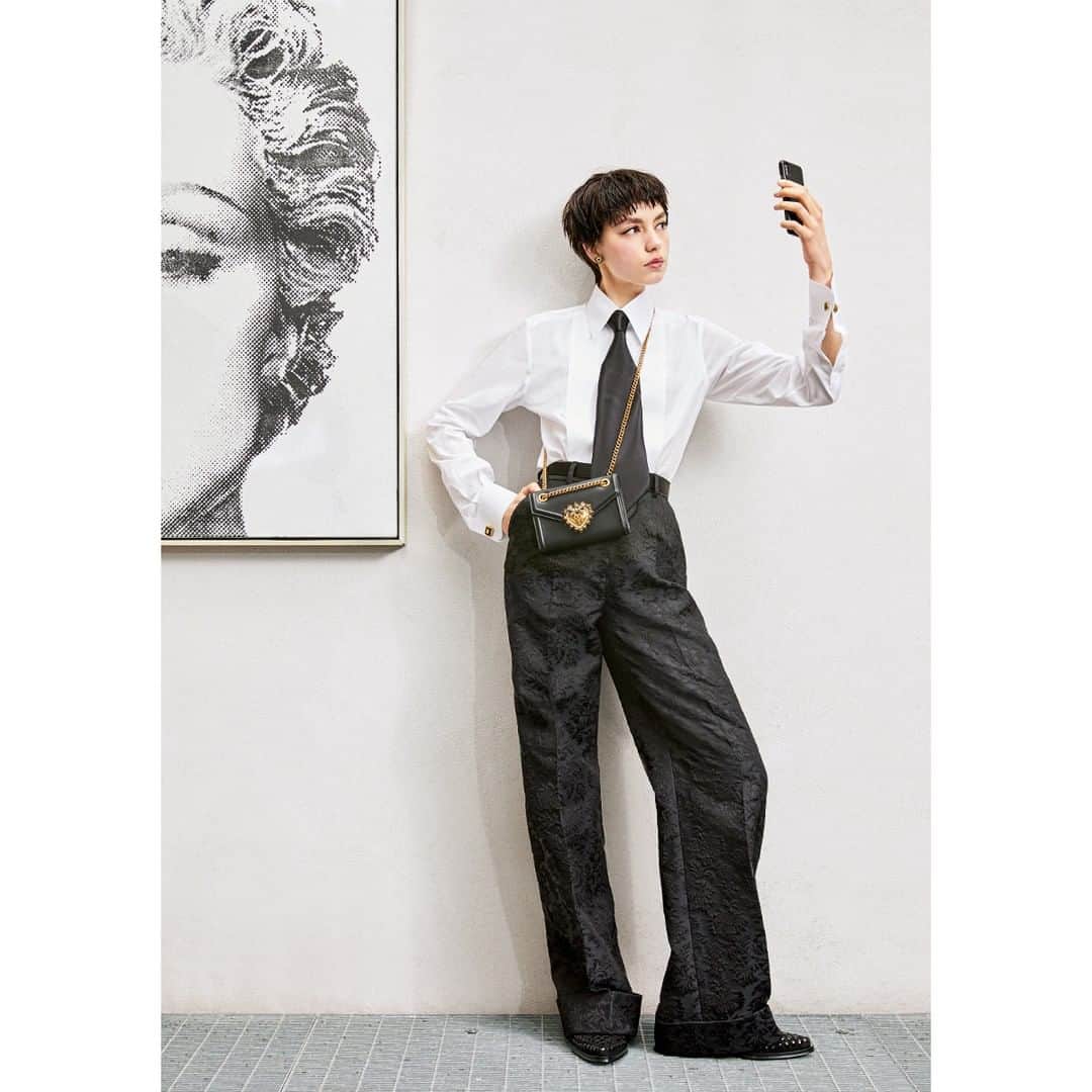 のインスタグラム：「The #DGWomen look is characterized by precious fabrics and structured lines and is completed with a #DGDevotionBag. #DolceGabbana #DGFamily」