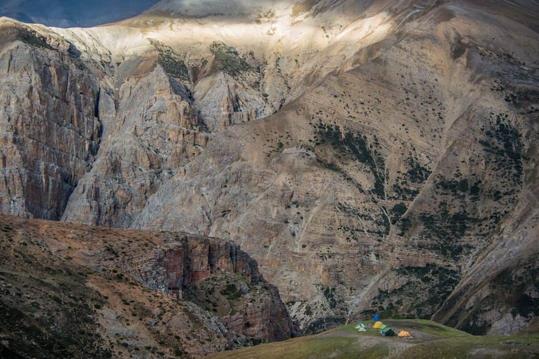National Geographic Travelさんのインスタグラム写真 - (National Geographic TravelInstagram)「Photo by @bethjwald | Trekkers’ tents—pitched across from the ancient Tsakang monastery, an important Tibetan Buddhist site—are dwarfed by steep canyon walls in the remote region of Upper Dolpo, Nepal.」2月16日 10時04分 - natgeotravel