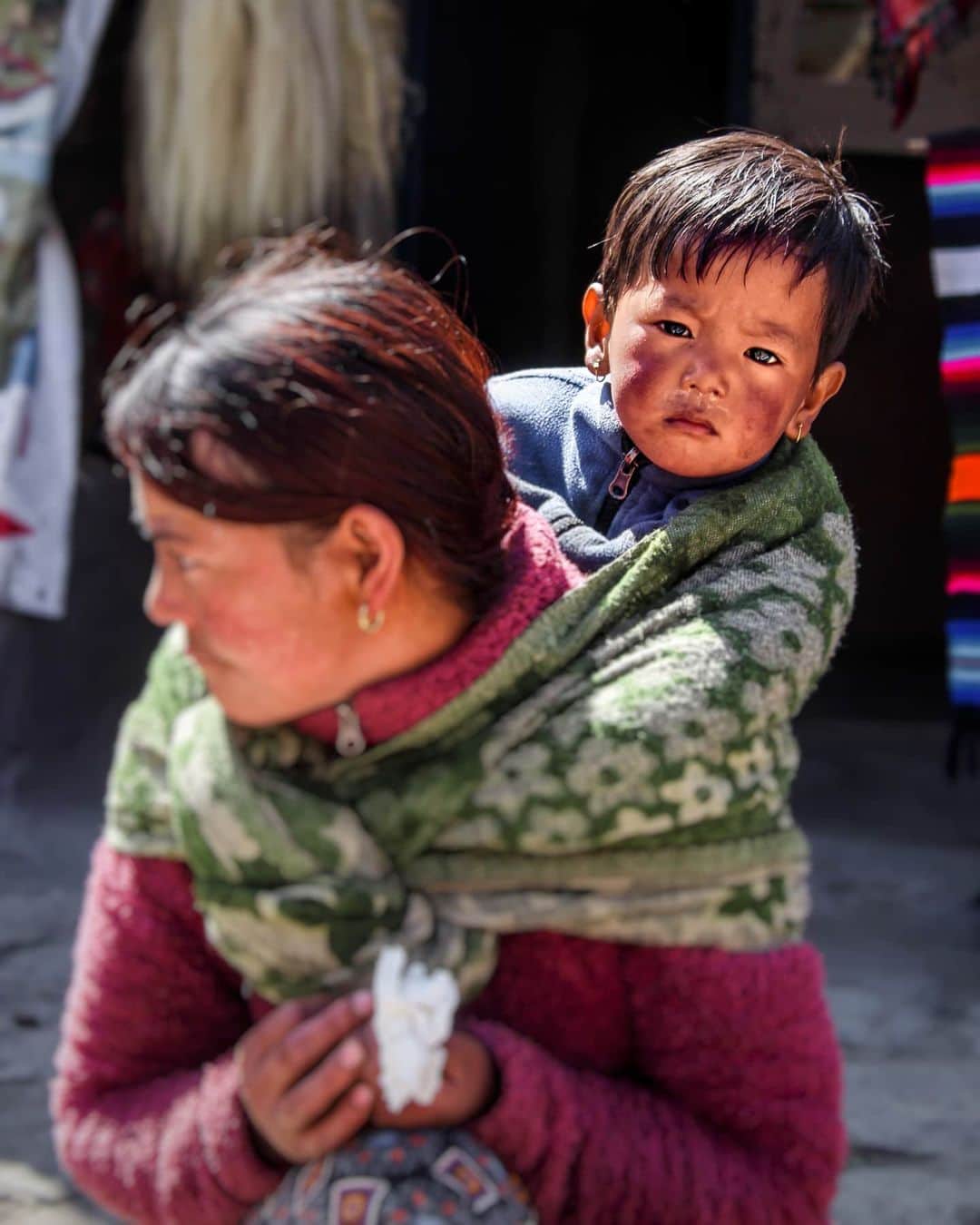 Canon Asiaのインスタグラム：「Capturing human intimacy always creates a sense of relatability to the viewer, especially when it speaks about a mother’s love. . 📷 Image by @mr_junior_aman shot using the Canon EOS 700D | EF-S55-250mm f/4-5.6 IS STM | f/5.6 | 1/160s | ISO 100 | 55mm . Want your photos to be featured too? Tag them with #canonasia or submit them on My Canon Story, link in bio! . #canonasia #photography #mustang #nepal #streetphotography #potrait #portraiture #colours #eos700D #travel #family #love #teamcanon」