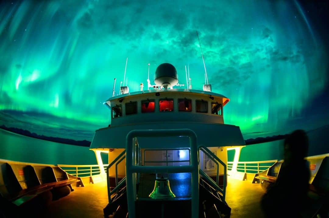 National Geographic Travelさんのインスタグラム写真 - (National Geographic TravelInstagram)「Photo by @jonathankingston | Is seeing the aurora borealis on your bucket list? Magnificent and magical are two words that capture the pure state of wonder I found myself in while sailing on board the National Geographic Sea Bird under this spectacular display of northern lights in Alaska’s Glacier Bay National Park and Preserve. The red light visible through the windows of the bridge are used to preserve the captain’s night vision while reading nautical charts. #Alaska #GlacierBayNationalPark #NorthernLights #AuroraBorealis」2月18日 6時05分 - natgeotravel