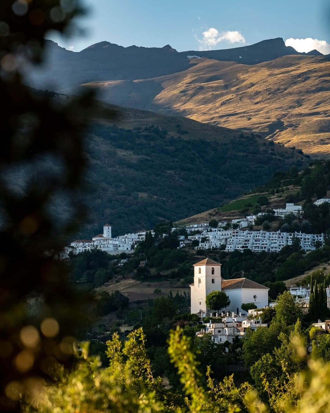 National Geographic Travelさんのインスタグラム写真 - (National Geographic TravelInstagram)「Photo by @KristaRossow | Last summer I explored the tiny white villages of Las Alpujarras, a region in the southern foothills of the Sierra Nevada in Spain. These villages are connected by a system of medieval trails. I spent my days traipsing from village to village, taking in the slow Spanish summer. Here the village of Bubión is illuminated by the last rays of sunshine fading over the Poqueira Valley.  For more images from around the world, follow me @KristaRossow. #Spain #Andalucia #sunset」3月21日 9時04分 - natgeotravel