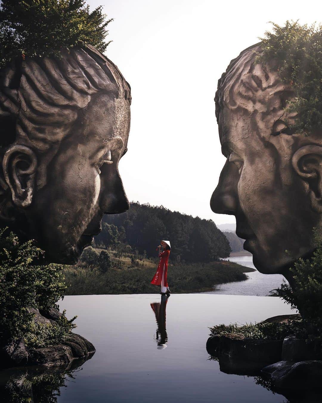 のインスタグラム：「The nature was graceful. The pond was calm. The giants continued to gaze at her with peace and blessings. #hellofrom Dalat Viet Nam ・ ・ ・ ・ #bestvacations #beautifuldestinations #earthfocus #earthoffcial #earthpix #thegreatplanet #discoverearth #fantastic_earth #awesome_earthpix #ourplanetdaily #lifeofadventure #nature #livingonearth #theweekoninstagram  #theglobewanderer #stayandwander #welivetoexplore #wonderful_places #TLPics  #voyaged #sonyalpha #bealpha #aroundtheworldpix #moodygrams #artofvisuals #travellingthroughtheworld #streets_vision #complexphotos #hsinthefield @sonyalpha @hypebeast @highsnobiety @lightroom @soul.planet」
