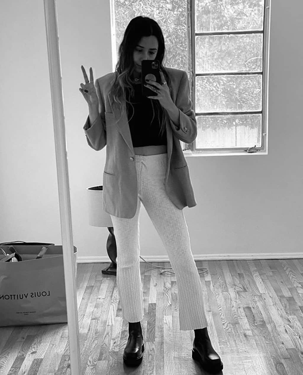 ジプシー05のインスタグラム：「@nicolemariefranco wearing our Lyon Muscle Tank in black layered with an oversized blazer for the perfect off-duty look #therecommence」