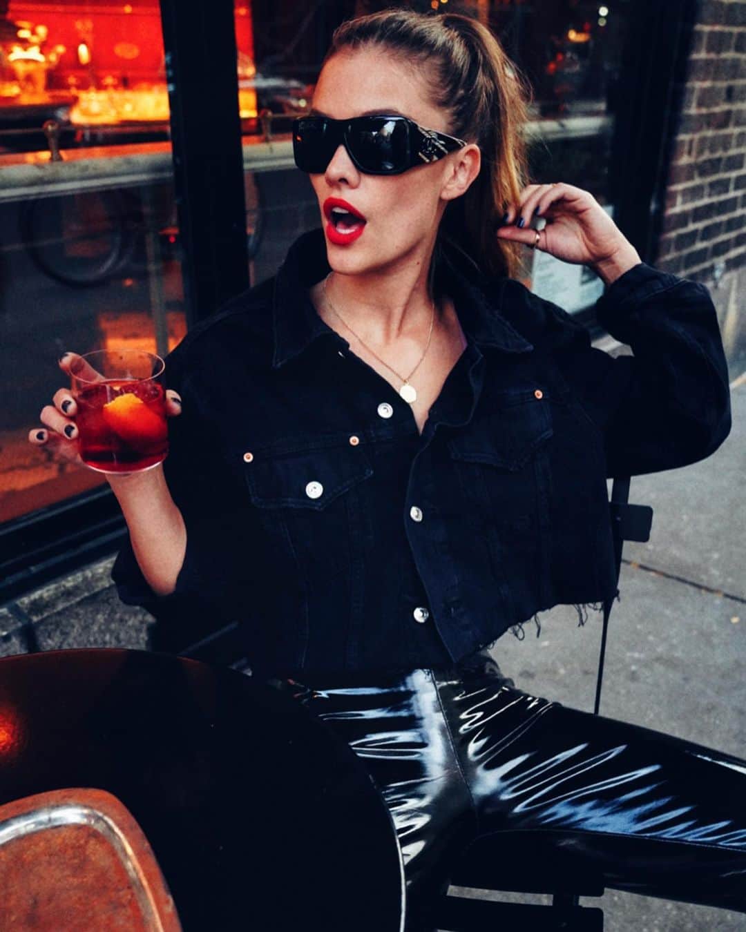 ニーナ・アグダルのインスタグラム：「Faux patent leather pants are great and all but why is no one talking about the sticky buns that comes with wearing em? 📸 @taylorbphoto」