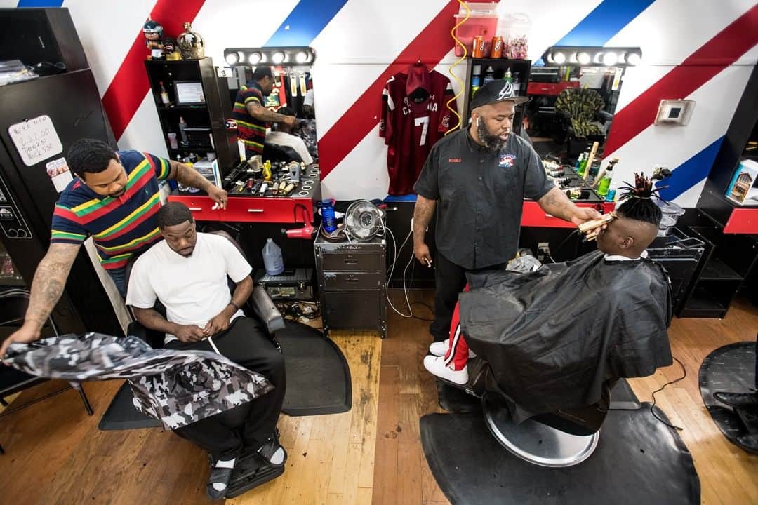 NBC Newsさんのインスタグラム写真 - (NBC NewsInstagram)「ReCarlo Lewis, owner of Lucciono's barbershop, and Eldred Anderson attend to clients in North Charleston, #SouthCarolina, on Wednesday.⁠ .⁠ "The barbershop plays a big role in the black community — from clothes, style, sports, politics. Maybe they should try to get more in tune with barbershops to understand what we care about," Anderson said about presidential candidates trying to win support before the state's primary on Saturday.⁠ .⁠ "I want to hear less about who they are and more about the issues," he said. Tap the link in our bio to read more on why barbershops are a place to visit for candidates wanting to reach black voters.⁠ .⁠ 📷 Sean Rayford / for @nbcnews」3月1日 7時26分 - nbcnews