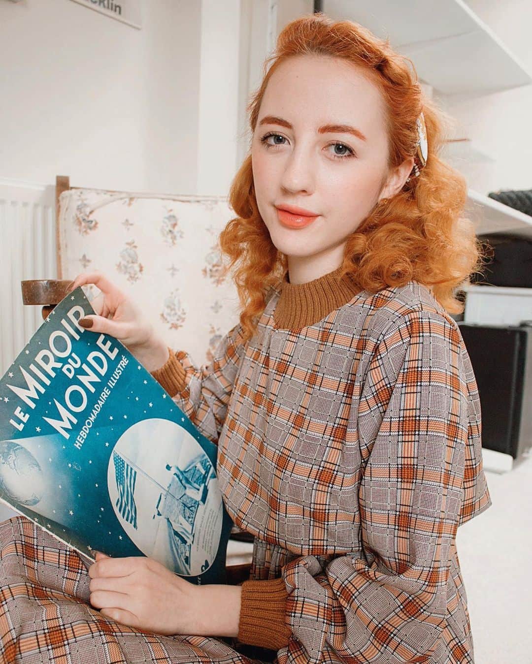 ベッキー・クルーエルのインスタグラム：「le miroir du monde ☁️ a lens on the world from 1931. ⁣ ⁣ Another treasure from my trip to Paris in 2017, this beautiful old French newspaper is complete with photographs and news from the time, as well as contemporary hand illustrated advertisements. ⁣ ⁣ I used google translate’s live camera to understand some of the articles a little better. I imagine if I showed that kind of technology to the original reader they would be so overwhelmed!⁣ ⁣ It feels so special to be the first one to turn these pages in decades. Next year these pages will turn 90 years old. I’ll treasure them until then.」