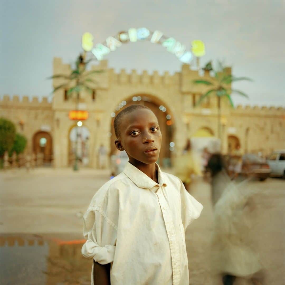 ナショナルジオグラフィックさんのインスタグラム写真 - (ナショナルジオグラフィックInstagram)「Photo by @paolowoods | Mohamadou Sagna, 13, from Kaolack, Senegal, is a former talibé, or Islamic school student. He ran away from his former teacher, who he said had forced him to beg, and didn’t return home, fearing that his parents might send him back. He and a group of other talibé runaways roam the streets of Dakar, fending for themselves. In the afternoons, they often hang around the amusement park Magic Land, on Dakar’s western corniche, but they don't have the means to enter.」3月21日 23時37分 - natgeo