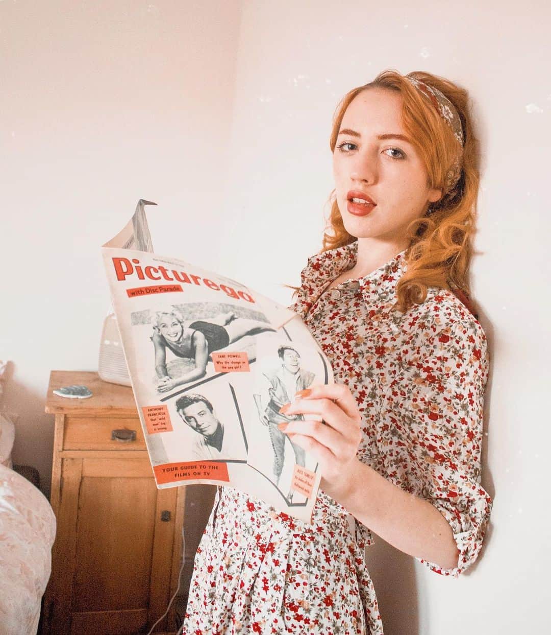 ベッキー・クルーエルのインスタグラム：「ruby pages from golden ages 😍 ⁣ ⁣ If I remember correctly, @kelsey_ellison gave me this copy of Picturegoer from 1958. ⁣ ⁣ I have a few early issues of this magazine but this slightly more recent copy really shows the advances in both the magazine and the film industry. ⁣ ⁣ There’s more opinion pieces and you can see the early tabloid traces of celebrity journalism. ⁣ ⁣ Also love seeing the chance to become ‘Miss Ryvita 1958!’ I wonder who won... ⁣ ⁣ My dress is vintage from @cowmanchester and my scarf is from a charity shop.」