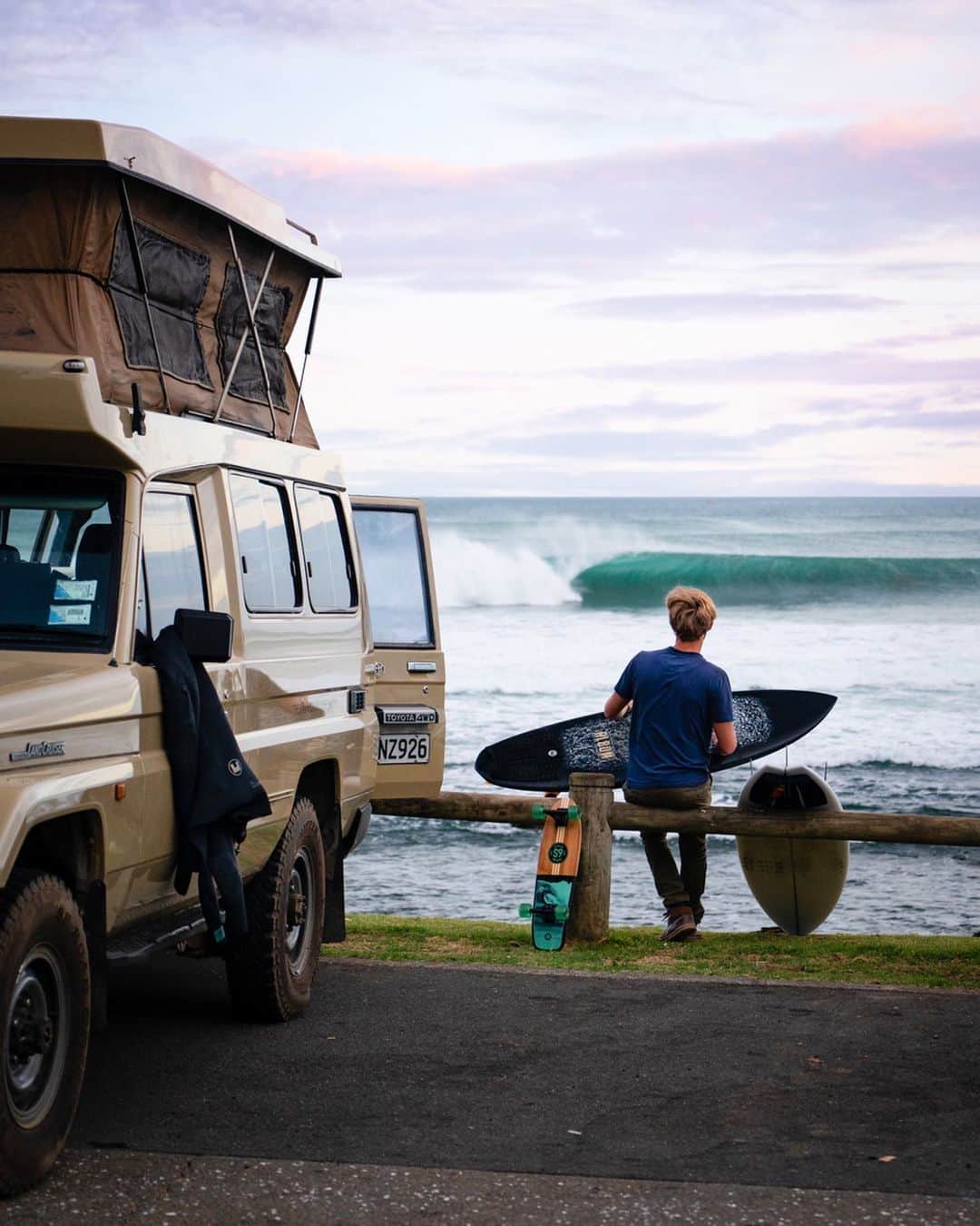 Travis Burkeのインスタグラム：「A few months ago I put a photo of perfect New Zealand waves on my desktop background as part of my “vision board” inspiration. @gypsealaysea and I ended up booking last minute plane tickets with our credit card points and are now here surfing some of the best waves of our lives! ...and skateboarding endless sidewalk waves too.  Huge thanks to @trekkeradventures for such an epic rig to explore in!  The swell just died so we are heading south to see more of what NZ has to offer. Can’t wait! #NewZeland #surf #troopy #pumptrack #mywholebodyissore #purenewzealand」