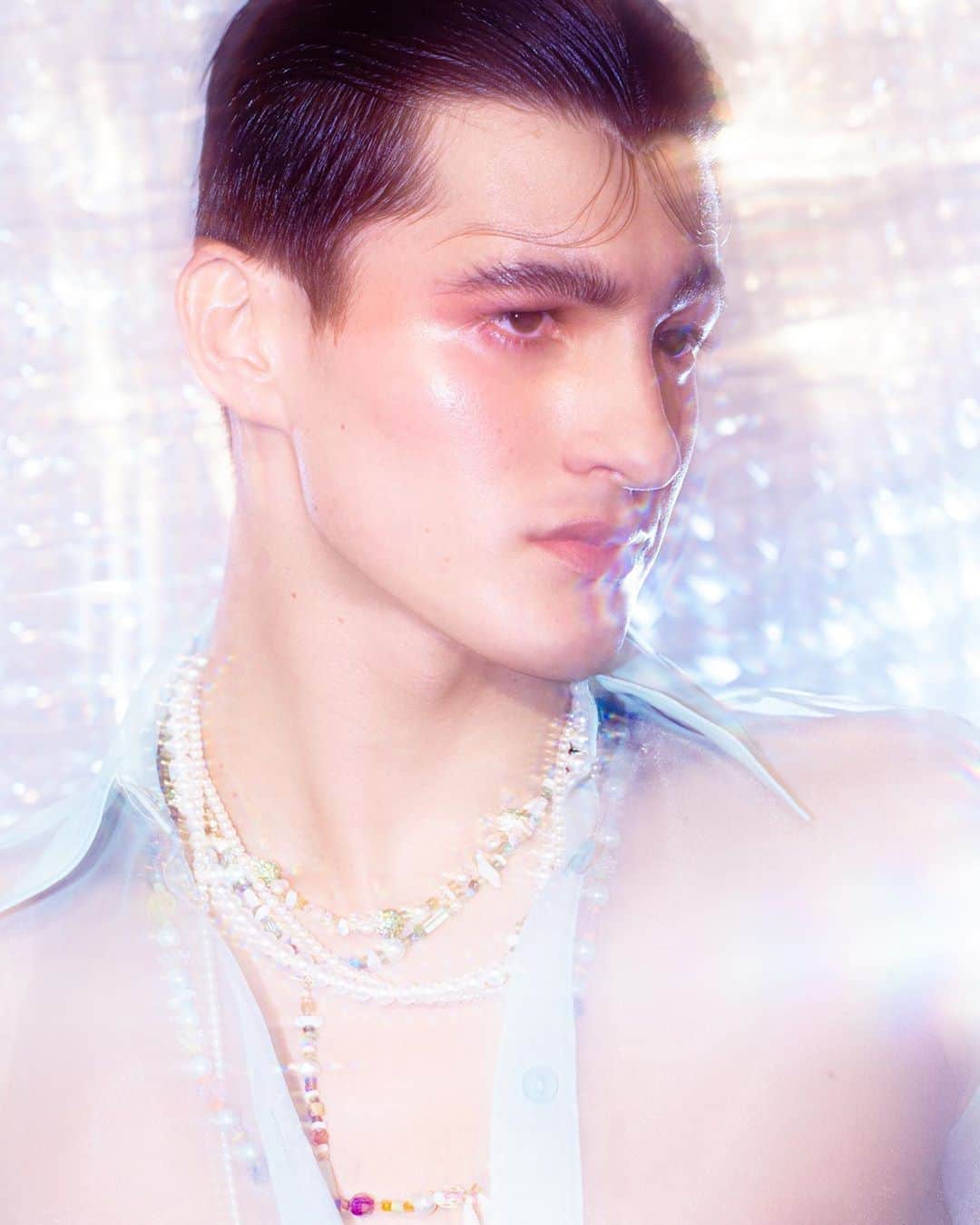 Shun Watanabeのインスタグラム：「@kamil_natsuaki wearing  @simonmillerusa shirts with @newsiancom jewels🌈✨💕🧜‍♂️ Photography @atsukiito_  Hair and Make up @harukadebeau  Model @kamil_natsuaki  Creative Direction and Styling @shun_watanabe  #simonmillerusa #newsian  #houseofkitasando」