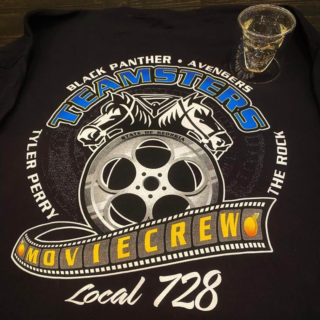 ドウェイン・ジョンソンさんのインスタグラム写真 - (ドウェイン・ジョンソンInstagram)「Very cool gift 👕 that means a lot to me from our Teamsters.  As a “thank you” they had this t-shirt made recognizing the entertainment entities that have had the most impact on the state of Georgia’s economy/ Marvel  My brother, @tylerperry  And the big, brown, bald tattooed fella.  For the past decade, it’s been a privilege for our @sevenbucksprod to bring big budget business to the state of Georgia and create some opportunities for all the local business owners we shake hands with.  Raising a @teremana toast 🥃 of gratitude to my brothers (and sisters) of the International Brotherhood of Teamsters.  Thank you Trace! @tlane_transpo  #brotherhood  #teamsters  #tcb」3月15日 6時56分 - therock