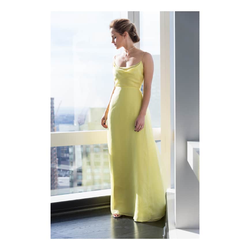 ザ・プレス・ツアーのインスタグラム：「A closer look at the making of the custom @dior light yellow organza dress and cape worn at the @beautyandthebeast premier in New York City. The piece was created in Dior ateliers by Maria Grazia Chiuri and crafted from certified organic silk 💚」