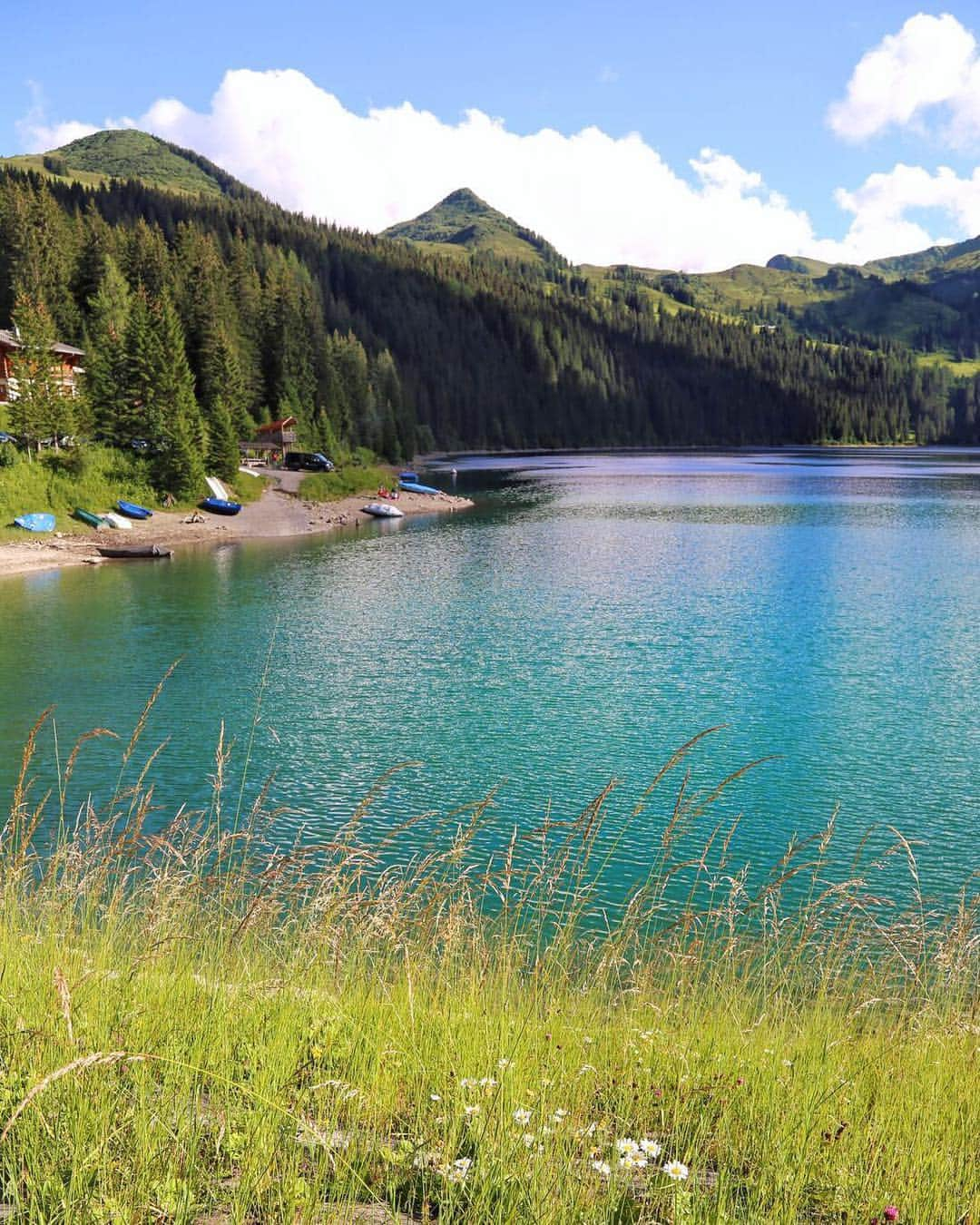 missjetsetterのインスタグラム：「Still thinking of the stunning Lake Arnensee, which is only an hours drive from @thealpinagstaad with @preferredhotels 😍 Hoping everyone who celebrated Swiss National Day yesterday had a wonderful holiday🇨🇭 It's one of my very favorite holidays & I've been lucky enough to have experienced the amazing festivities first hand a few years ago🎉」