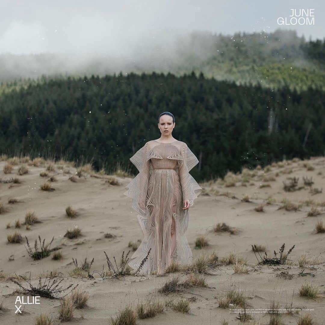アリー・エックスのインスタグラム：「June Gloom: the quarantine theme song that I didn’t know I was writing. June Gloom was written on my second trip to Stockholm, alongside Learning in Public and a song that didn’t make the final cut. I came up with the title on a flight, though I can’t remember which one. This was a demo that many on my team didn’t like when they first heard it (I’ve learned to ignore these reactions and go with my gut). But a year later in the context of the album, they did haha. ⁣⁣ ⁣⁣ The song is about a) my many sick summers where I had to stay inside while my family and friends went on trips, to party’s, had summer romances etc. and then b) what’s the point of doing ANYTHING anyway?😒😫😁. The lyrics are meant to be sarcastic and dry with a touch of self deprecation and a sprinkle of existential crisis. My personal favorite is ‘ June gloom , oh doom doom, and we’re feeling the big decay, so put up your hands and say JUNE GLOOM! What a beautiful sadness’. ⁣⁣I wrote this song with Oscar Görres and James Alan. I remember wanting to do something with more of a soulful groove. I remember James came up with this amazing lyric ‘All the stars are dying, like everyone that I’ll ever know’. I remember the ‘stupid’ drum fill into the last refrain. ⁣⁣ ⁣ What else....? I wrote a video treatment I loved for June Gloom, but it needed a massive budget haha. Thank you to @irisvanherpen for this incredible piece and my creative team for roughing it out to get this shot. More on that when I share the other photos.... 📷 @burtoo」