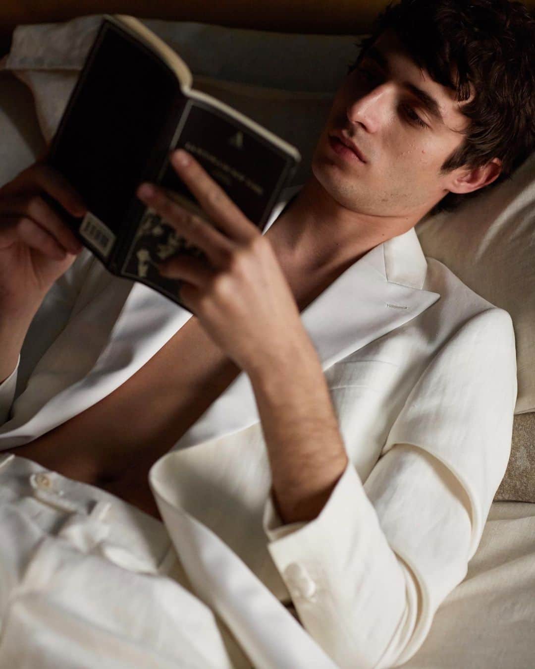 のインスタグラム：「«#White is not a mere absence of colour; it is a shining and affirmative thing, as fierce as red, as definite as black» (G.K. Chesterton - writer and poet)  #SS20 #EveningCollection #CarusoMenswear」