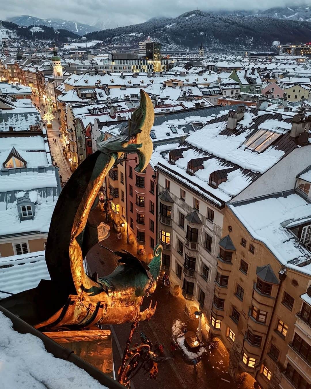 National Geographic Travelさんのインスタグラム写真 - (National Geographic TravelInstagram)「Photo by Robbie Shone @shonephoto | From this lofty location overlooking the old town, the city of Innsbruck in the heart of the Austrian Alps is seen covered with a dusting of snow.」4月19日 9時05分 - natgeotravel