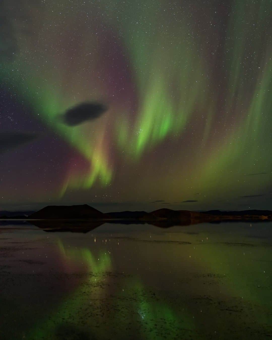 National Geographic Travelさんのインスタグラム写真 - (National Geographic TravelInstagram)「Photo by @babaktafreshi | Ribbons of the northern lights appeared above Lake Myvatn at 65° N during this early fall night in Iceland. The lake was formed by a massive lava eruption 2,300 years ago. #twanight #auroraborealis #nightphotography #northernlights」4月19日 21時07分 - natgeotravel