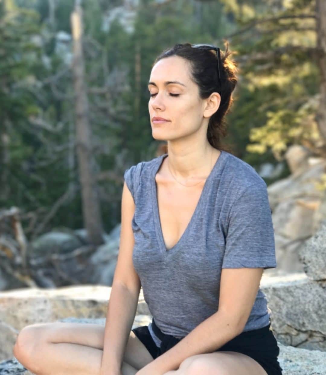 Leslie Camila-Roseのインスタグラム：「A rare photo of me meditating in a truly magical place. I must admit, it feels me with joy to remember this beautiful afternoon. ☺️ “ The world is not a problem to be solved; it is a living being to which we belong. The world is part of our own self and we are a part of its suffering wholeness. Until we go to the root of our image of separateness, there can be no healing. And the deepest part of our separateness from creation lies in our forgetfulness of its sacred nature, which is also our own sacred nature.“ Thích Nhất Hạnh, Spiritual Ecology: The Cry of the Earth  #sacrednature #buddhistwisdom #naturallaw #universallaws #pachamama」