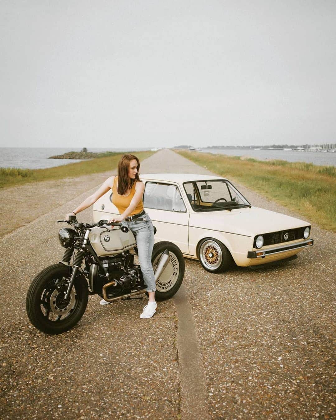 epidemic_motorsさんのインスタグラム写真 - (epidemic_motorsInstagram)「BMW CAFERACER / VW GOLF MK1 1977 Bike: @arjanvandenboom Car: @thom_lifestyle  Model: @marijeee_x_x_  What about this combination? I really love the vintage colours! Bike or car? 😊 I love them both . #caferacers#caferacer#caferacerporn#honda#bmw#suzuki#golfmk1#mk1#lifestyle#helmet#deus#vintage#bike#motor#motorcycle#vintagebike#retro#oldschool#golf#porsche#porsche911#oldcar#vw#vwgolf#bratcafe#bmwmotorrad#bmwmotorcycle#volkswagen#bmwcaferacer#custom」4月23日 19時40分 - epidemic_motors