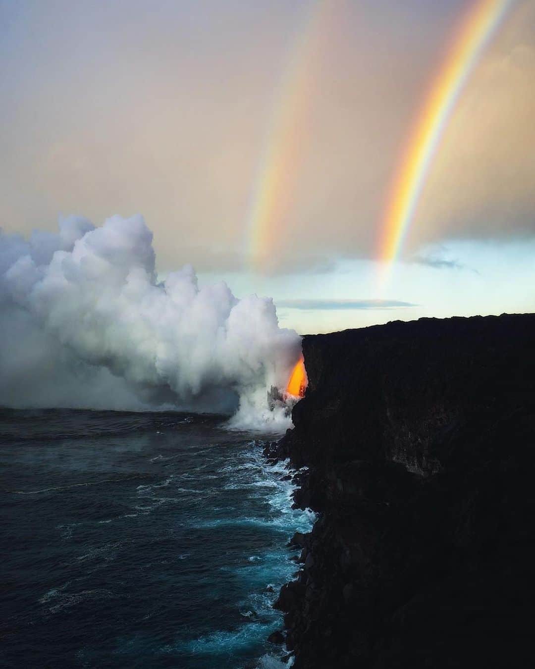 Instagramさんのインスタグラム写真 - (InstagramInstagram)「#HelloFrom Hawaii Volcanoes National Park on the Big Island. We’re dreaming of this delicate double rainbow and powerful lava flow, all flowing together into the ocean.⁣ ⁣ Photo by @andrew.studer」4月27日 1時21分 - instagram