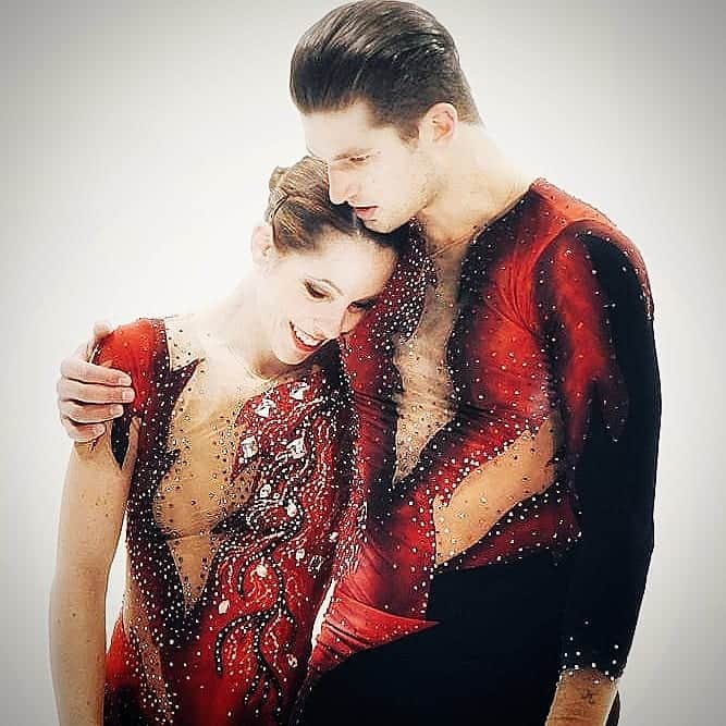 ニコーレ・デラ・モニカのインスタグラム：「Oggi vi auguro una buonissima domenica con il ricordo di questo programma. I "Carmina Burana" sono pezzi molto forti e per l'occasione questo costume creato da @claudia_blulight seguendo il disegno di un amico, ne esprimeva tutta la potenza. Pensate che è stato pensato proprio per rappresentare al meglio il tema musicale, infatti sul retro c'erano delle parole che volevano essere parte del cantico, impresse sulla nostra pelle come tatuaggi ma bruciati dalle fiamme poiché quei canti erano proibiti. Fiamme dipinte a mano minuziosamente. Non è stato facile crearlo ma Claudia come sempre è stata più che all'altezza 💪⛸️💙 Ph cr @risportskates (la prima) @mihail_sharov (the others)  #dellamonicaguarise #figureskating #carminaburana #costume #memories #buonadomenica」