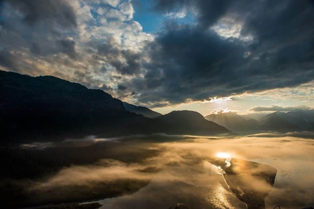 National Geographic Travelさんのインスタグラム写真 - (National Geographic TravelInstagram)「Photo by @bethjwald | The setting sun lights up clouds and fog on the Stikine River in Southeast Alaska. Stikine means "great river" in the native Tlingit language. The massive wild river has carved a braided channel past glaciers and through dense temperate rainforest, reaching the Pacific near Wrangell, a small town on the Inside Passage.」4月28日 1時06分 - natgeotravel
