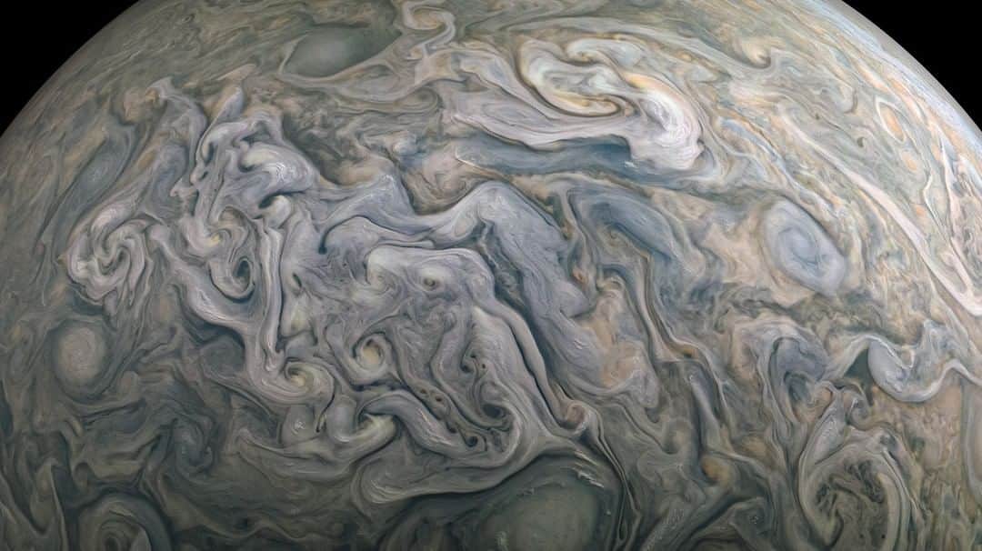 NASAさんのインスタグラム写真 - (NASAInstagram)「I spy with my little eye...swirling creamer in a cup of coffee. No, an octopus. We can't decide. What do you see in Jupiter’s clouds?⁣ 👀 ⁣⁣ Our @nasajuno spacecraft photographed the giant planet's swirling cloud tops during an April 10 flyby. At the time, the spacecraft was about 5,375 miles (8,650 kilometers) from Jupiter’s cloud tops and was traveling about 127,000 mph (204,000 kilometers per hour) relative to the planet. We're studying Jupiter because understanding its origins will help us understand the origins of our solar system. It's a big planet — with big secrets. ⁣ ⁣ Image credits: NASA JPL-Caltech/SwRI/MSSS⁣ Image processing by citizen scientist Kevin M. Gill, © CC BY 3.0⁣ ⁣ #ispywithmylittleye #jupiter #swirledpeas #space #nasa」4月28日 6時58分 - nasa