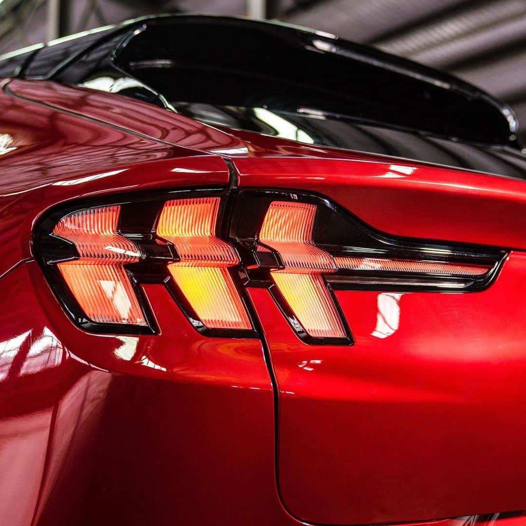 Fordさんのインスタグラム写真 - (FordInstagram)「It’s all in the details. >>> . With modern sculpted lines, a low streamlined stance, and sequential tri-bar taillights, the #MustangMachE is undeniably built to honor its iconic heritage. . *Preproduction model shown . #Ford #FordMustang #ElectricVehicles」4月30日 1時43分 - ford