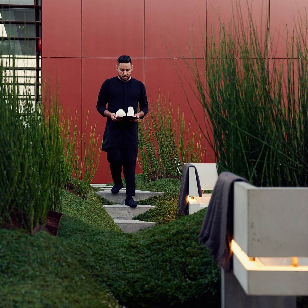 ニューヨーク・タイムズさんのインスタグラム写真 - (ニューヨーク・タイムズInstagram)「Since @vespertine.la opened in July, its $250 tasting menus (tax and service charge not included) have left people perplexed, impressed, annoyed or all 3. “Anybody inclined to paint this restaurant as a steaming pile of pretentious nonsense will find that Jordan Kahn, the chef and overall impresario, is standing there with an open paint bucket and a brush,” @petewells writes in @nytfood. To @gq, Jordan described the restaurant’s building — a 4-story tower with an orange exoskeleton of warped steel — as “a machine artifact from an extraterrestrial planet that was left here like a billion years ago by a species that were moon worshippers.” @nytfood's @petewells spent most of an evening at @vespertine.la and still has no idea what Jordan was talking about. As for the food? “Some courses were almost inviting,” he writes. “Others seemed determined not to be eaten at all.” But, he continues: “Nothing tasted as weird as it looked. For this I was grateful.” Heightened attention to visuals is routine for chefs these days. This is not Jordan Kahn’s game; some @vespertine.la dishes are virtually unphotographable by design. To see the dishes (and other scenes) @jokemichaels captured while on assignment for @nytfood, swipe left.」10月25日 13時00分 - nytimes