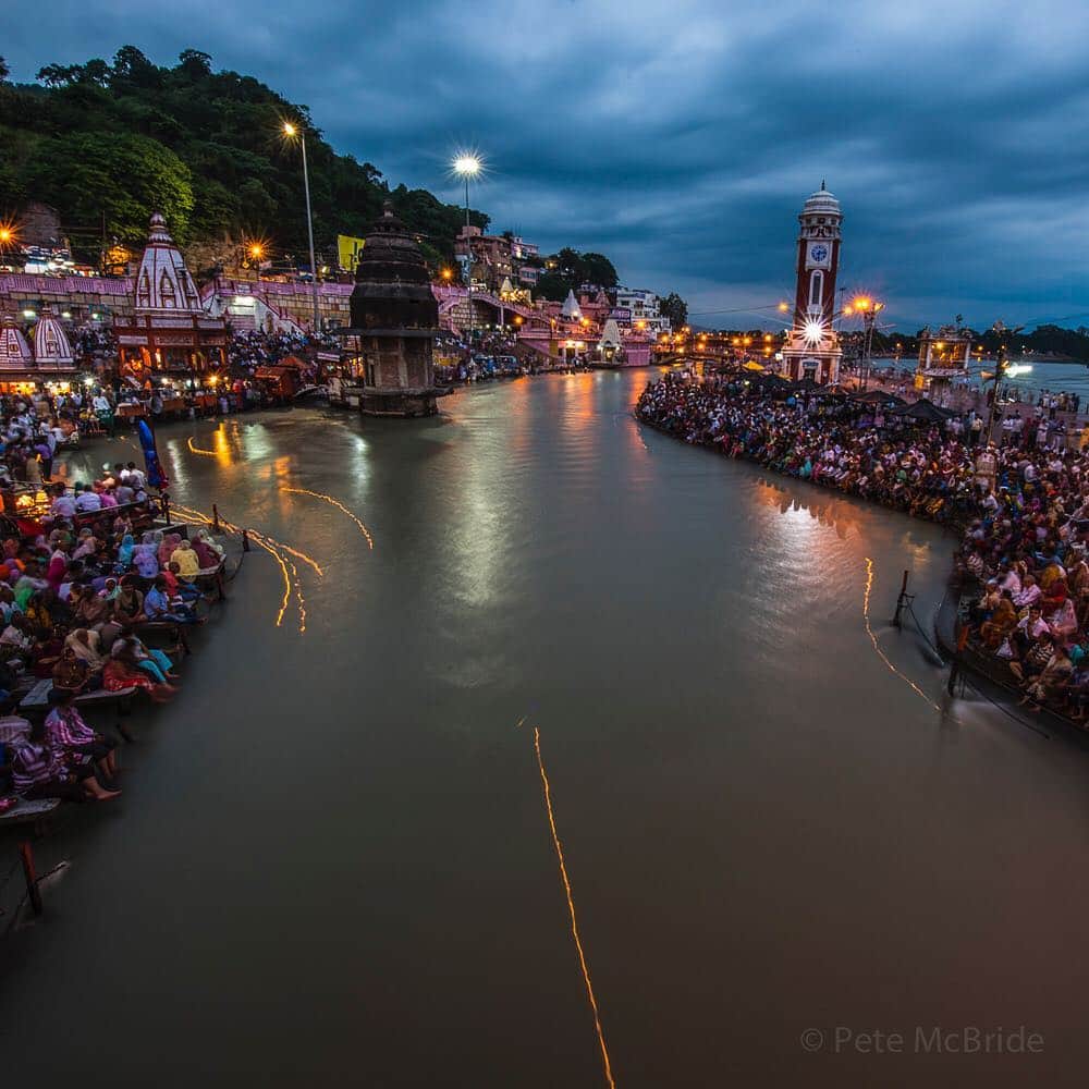 National Geographic Travelさんのインスタグラム写真 - (National Geographic TravelInstagram)「Photo by @pedromcbride (Pete McBride) // The lights of of small candles carrying prayers, float down the Ganges River at the daily aarti ceremony. People come every evening to sing and wash their sins away, but many ask “when will we clean the sins we put upon this river”. Littered with plastic and heavy metals, the Ganges is one of the most sacred rivers in the world, but also the most contaminated - by industry, agriculture and even religion. #Followme @pedromcbride to see a different view downstream. #plasticorplanet #chooseplanet #ganga #saynotoplastic」5月24日 13時02分 - natgeotravel