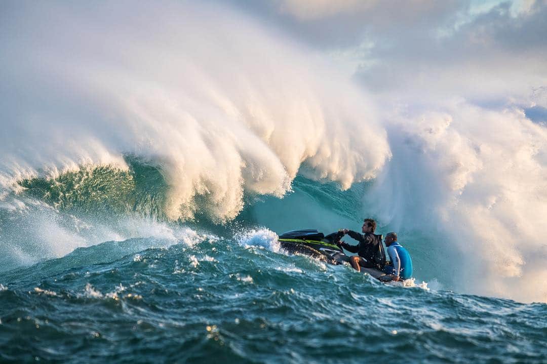 National Geographic Travelさんのインスタグラム写真 - (National Geographic TravelInstagram)「Photo by @michaelclarkphoto // To see the extreme sometimes you have to go to extremes. Riding a jet ski while capturing surfers on one of the biggest waves in the world at Peahi, also known as JAWS, on the north shore of Maui. #maui #peahi #jaws #bigwavesurfing」5月25日 5時19分 - natgeotravel