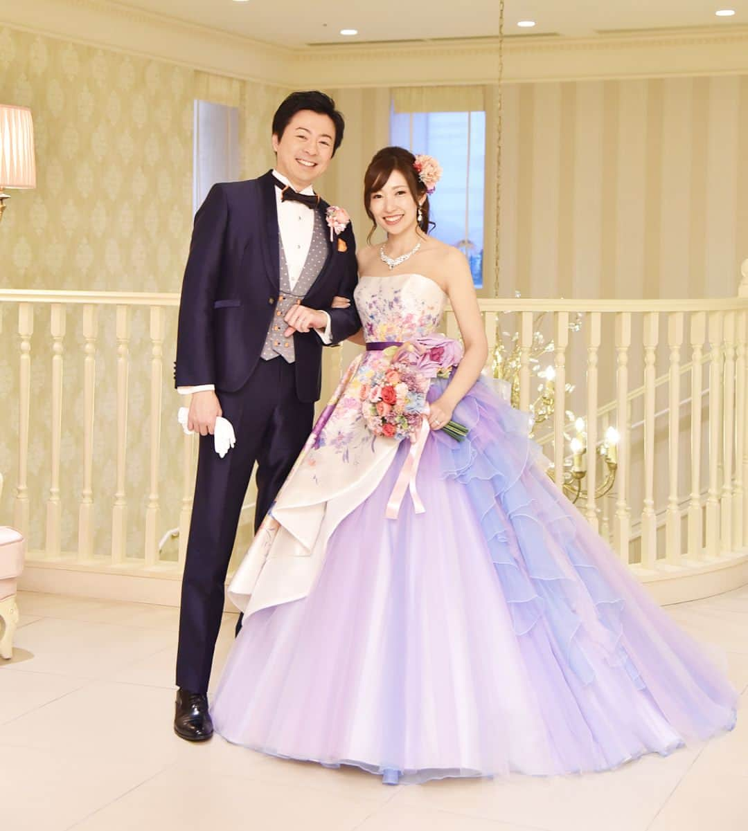 プレ花嫁の結婚式準備アプリ♡ -ウェディングニュースさんのインスタグラム写真 - (プレ花嫁の結婚式準備アプリ♡ -ウェディングニュースInstagram)「* * パープルを大人可愛く💓ステキに着こなした #新郎新婦 #コーディネート をご紹介😍✨ * * こちらのお写真は @y__k.wedding さんからリグラムさせていただきました🌟ありがとうございました😊✨ * * こちらのドレスは花嫁さんにとっても人気の #ドレス ブランド👗 #ハーディエイミス の #ラベンダーロザーリア というドレスです💕 * フロントの華やかなお花柄が素敵な1着💓で、アシンメトリーに流れたスカートと、ウエストのビッグフラワーがポイントになっています☺️✨ * #ブーケ 💐を使って撮影された #ウェディングフォト もとっても素敵😍 * キスショットは恥ずかしい❣️という新郎新婦さんも、顔隠しショットならチャレンジできるかもしれませんね😍💕 * ドレスもフォトアイデアも、是非参考にしてみてくださいね💓 * ……………………………………………………………… ❤️WeddingNewsとは？❤️ * * 花嫁のリアルな”声”から生まれた 花嫁支持率No1✨スマホ専用アプリです📱💕 * * 🌸知りたい… #結婚式準備 に役立つ記事を毎日150件配信中♩ * 🌸見たい… インスタの #ウェディング 系投稿TOP100が毎日アプリでチェックできる＊IG画像の複数ワード検索も可♩ * 🌸叶えたい… 全国・海外の結婚式関連の予約サイトが大集合♩詳細はをチェック⬇︎ * * プロフ画面のURLをからDLしてみてね✨ ……………………………………………… ❤️WN予約コンシェルジュとは？❤️ * * 式場 ・フェア・二次会・エステ・ドレス・フォト‥ * 花嫁の夢を叶える、結婚式関連の予約サービスがWeddingNewsアプリに大集結📱💕 * 更に、アプリ・LINEから予約・問い合わせをすると * 🎁《各サイト特典》＋《WN限定特典》が貰えて２倍お得🉐 * 詳細はアプリの予約ページをチェックしてね✨ * * 💚LINEで無料相談💚 * こんな条件のプランや式場はある？自分１人で決められない。。など、予約メニューに関してお悩みの方は予約コンシェルジュに気軽にLINEから相談してね♩ * * LINEの登録は @weddingnews_concierge のURLから行えます✨ ……………………………………………… ❤️ウェディングフォト ・ムービー❤️ * 随時募集中💕あなたの #結婚式 関係の写真・動画を投稿してください✨ #花嫁 さんに限らず、業者・作家さんも大歓迎♩ * ①【写真・動画】は #ウェディングニュース * ②【ヘアメイク】に関しては WNブライダルヘア * のハッシュタグをつけて、IGにアップしてください♪ * 特に魅力的な投稿は #ウエディング ニュースの公式IG（毎日のCM含む）・アプリ内・webメディアBLESSにてご紹介させて頂きます🙇✨ * たくさんの投稿をお待ちしています😍💕 * * #プレ花嫁 #結婚準備 #結婚 #ウェディングドレス #ブライダル #前撮り #パープルドレス #ドレス迷子 #ドレス試着 #プリンセス #カラードレス #2019年春婚 #2019年夏婚 #大人可愛い #ワンピース #二次会ドレス」9月9日 22時33分 - weddingnews_editor