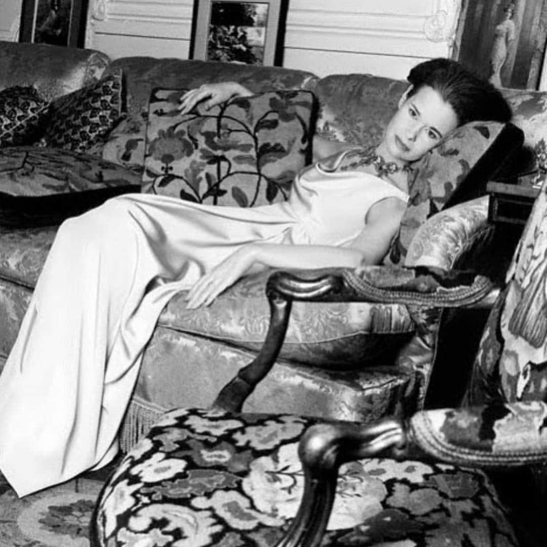 のインスタグラム：「A photo by #Horst for @harpersbazaarus. I was probably about 40 years old, it was before @andersoncooper was born. After a shoot I sometimes felt I had discovered something about myself I hadnt known, or seen, before.  In this photo, leaning back on our living room sofa in a #mainbocher dress, I was thinking of nothing at all, except I was in love and happy, and the future stretched before like a field of untouched snow.」