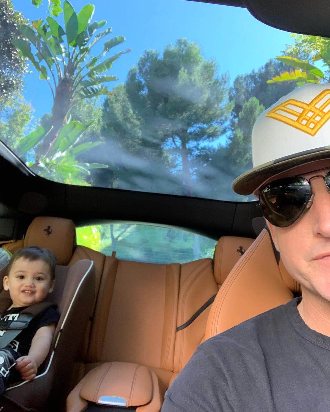 ロブ・ディアデックのインスタグラム：「Saturday afternoon cruising with Kodah Dash... no doubt the @ferrari #gtc4lusso is this 2 year olds  favorite car. He keeps asking to drive but I explain this is about as good as it gets till you’re like 7 or 8. 🤷🏻‍♂️🇮🇹🐎🏎」