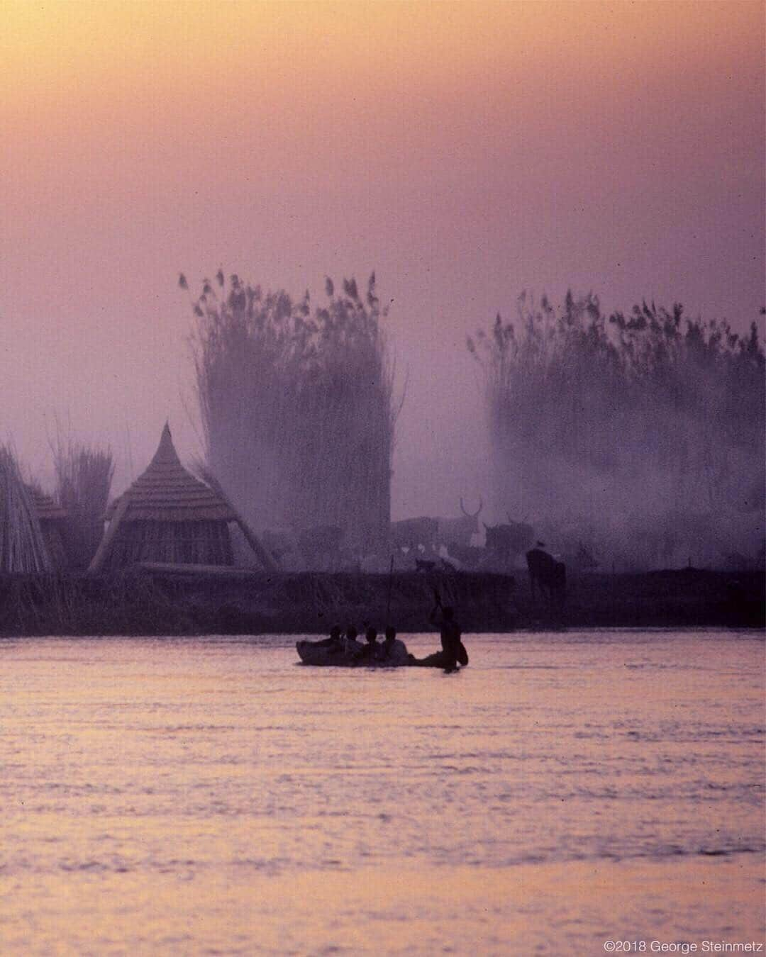 ナショナルジオグラフィックさんのインスタグラム写真 - (ナショナルジオグラフィックInstagram)「Photo by George Steinmetz @geosteinmetz | Dinka cattle camp as seen looking across The Nile in South Sudan in 1979.  I had just dropped out of Stanford and was on a nine month hitchhiking trip with a borrowed camera.  I wanted to get away from my upbringing, and found myself in a continent more fascinating than I could have imagined.  #Dinka #anthropology To follow my path, go to @geosteinmetz」11月5日 5時43分 - natgeo