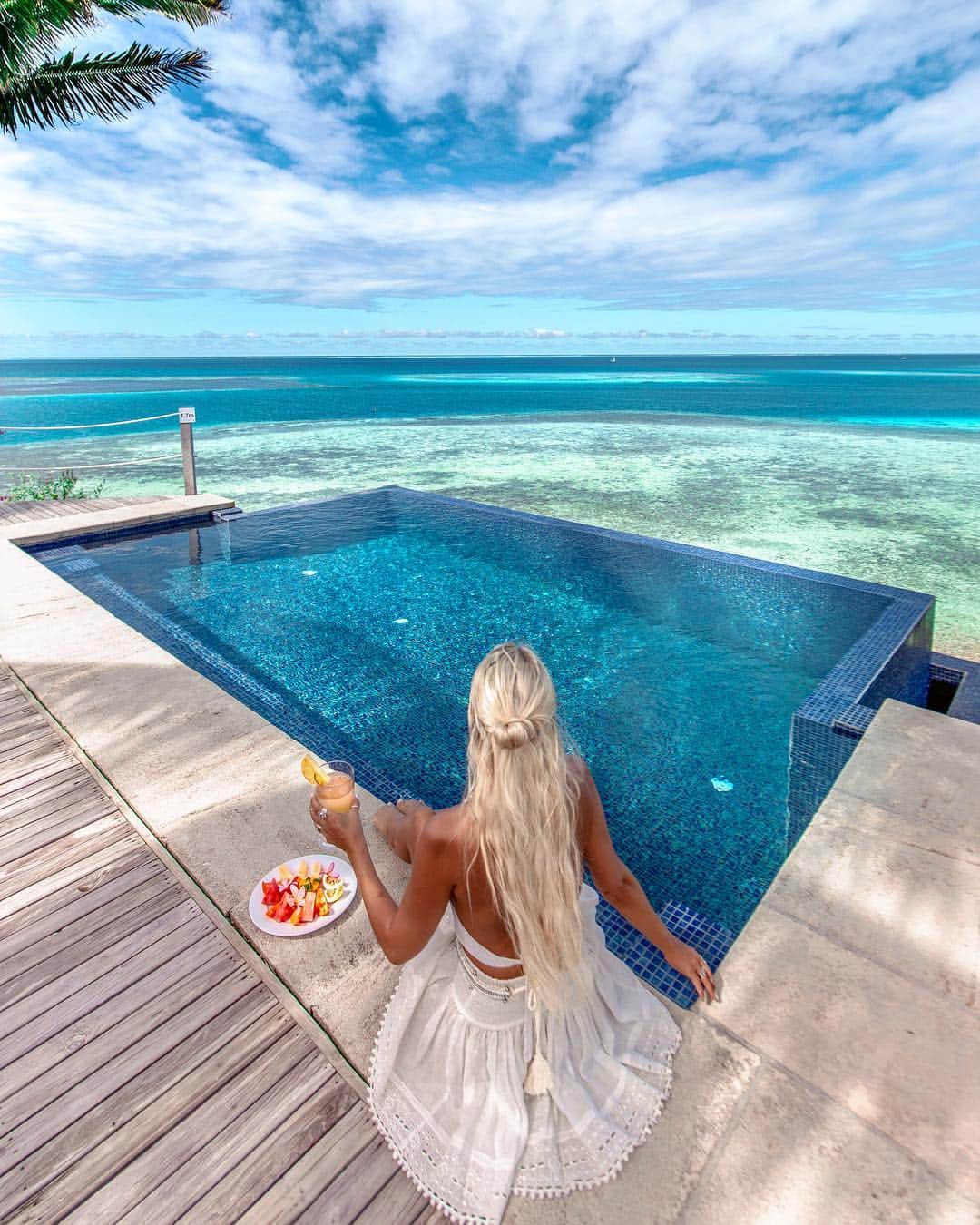 のインスタグラム：「Azure and turquoise views for days 🏝 enjoying my breakfast on my own private island paradise wearing @poupettestbarth 💦 Head to my blog {link in bio} to find all my my favourite resort wear 🐚 . #gypsylovinlightstyle #fujiisland #privateisland #poupettestbarth #resort #style #resortwear #infinitypool #wadigi #fiji #travel #travelblogger #ocean #mermaid #mermaidhair #wonderfulplaces #beachesnresorts #luxuryworldtraveler」