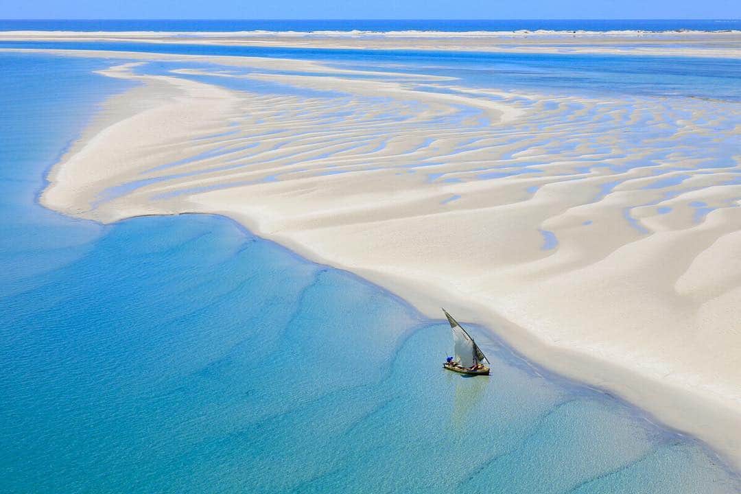 National Geographic Travelさんのインスタグラム写真 - (National Geographic TravelInstagram)「Photograph by George Steinmetz @geosteinmetz  Dhow boat in the channel between Bazaruto and Benguerra islands, off the coast of Mozambique. The islands boast pristine white beaches and colorful marine life, famous for dive sites and fishing. To view more of our earth from above, follow @geosteinmetz」11月15日 1時51分 - natgeotravel