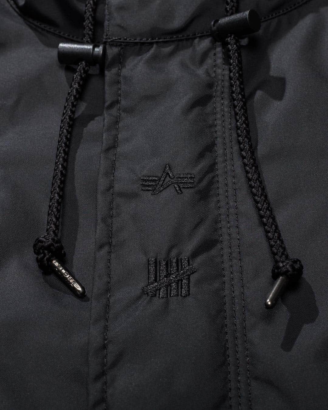 UNDFTDさんのインスタグラム写真 - (UNDFTDInstagram)「The UNDEFEATED x Alpha Industries Nylon Fishtail Mod Parka features a branded Undefeated flight ribbon, direct embroidery logos on front storm plackets and collegiate inspired twill branding. Other distinct Alpha elements include a water resistant shell, MA-1 utility pocket on sleeve, snap up fishtail back and red “Remove Before Flight” flag. // Available Saturday 11/17 at All Undefeated Chapter Stores and Undefeated.com」11月17日 2時12分 - undefeatedinc