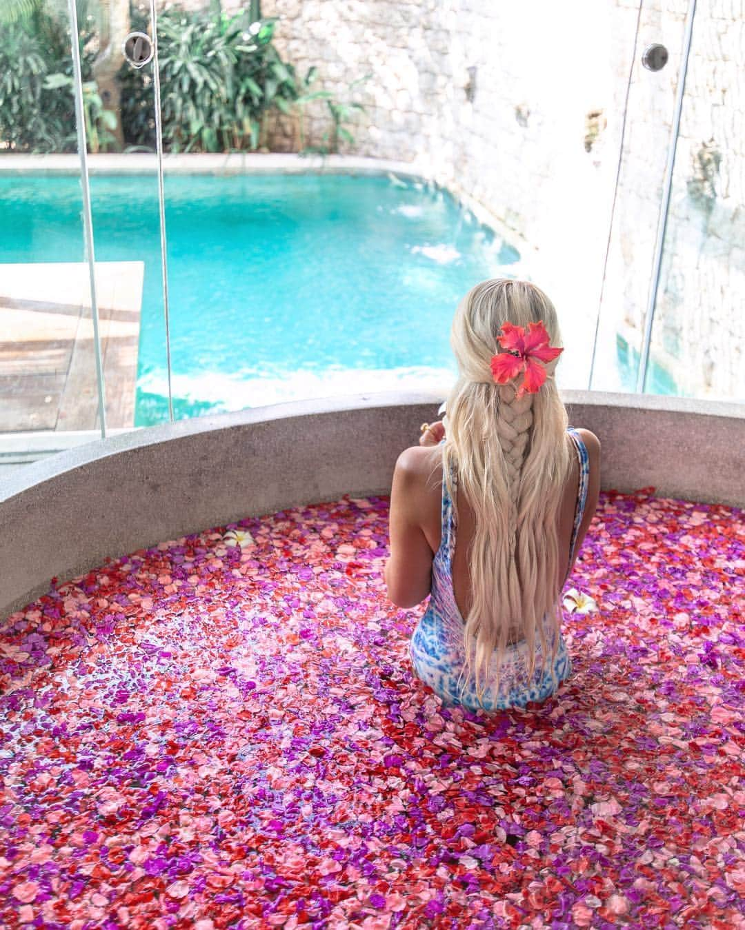 のインスタグラム：「Bali magic 🌸 in @wolventhreads swimsuit 💖 swipe across for some of my faves places to stay @batukaranglembongan and @sofitelbalinusadua 🙏🏼 . 📸 @bobbybense . #flowerbath #bali #bathgoals #villagoals #thebalibible #visitindonesia #nusalembongan #batukaranglembongan #nusadua #sofitelnusadua #sofitelbalinusadua #hotelsandresorts #beautifulhotels #beachesnresorts #wonderfulplaces #travelblogger #love #travel #gypset #style #ecofriendly #wolventhreads #swimwear」