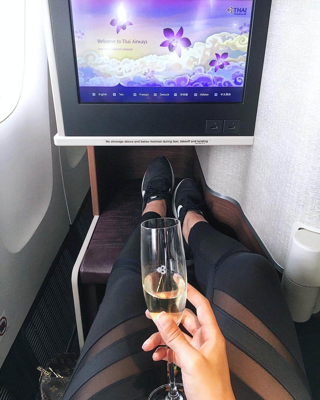 My chan || 舞ちゃんのインスタグラム：「Next 14 (!) flights booked! Hopefully they’re all as comfortable as this one on @thaiairways 🥂✨ #cheers 次の旅準備中。フライト14瓶予定(！)この#タイエアウェイズ みたいにリラックスできると良いな〜🥂✨ #カンパイ」