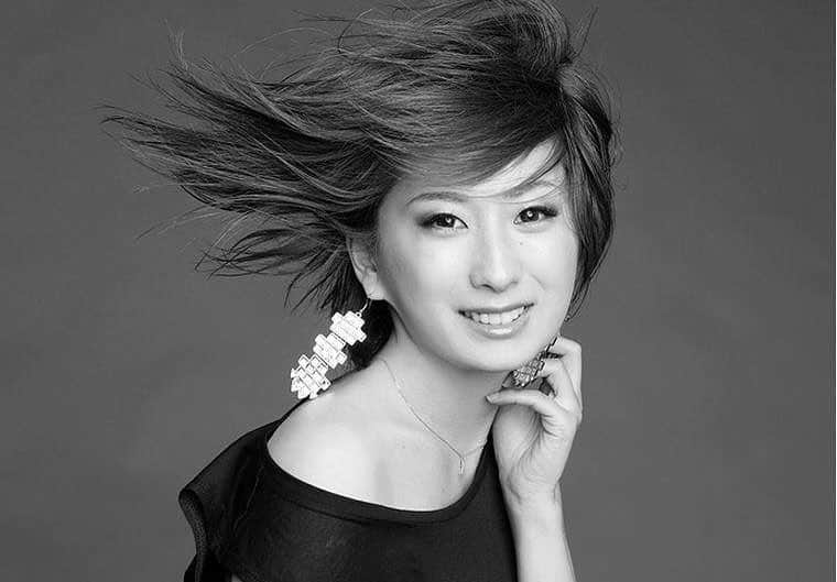 乾亜由美のインスタグラム：「そう言えばむかし、#レスリーキー さんに撮ってもらった写真、インスタにアップしてなかった。 緊張しながら現在入りし、プロのヘアメイクさんが綺麗にセットしてくれたのに、カメラの前に立ったら髪の毛ぐちゃぐちゃにされて大きな扇風機で風を吹かせられて、コンタクトがズレまくって泣きそうになりました。 けど仕上がりを見て納得満足！ 良い思い出♫  #ものくろ写真  #ホットリミット風 #西川貴教の気分」