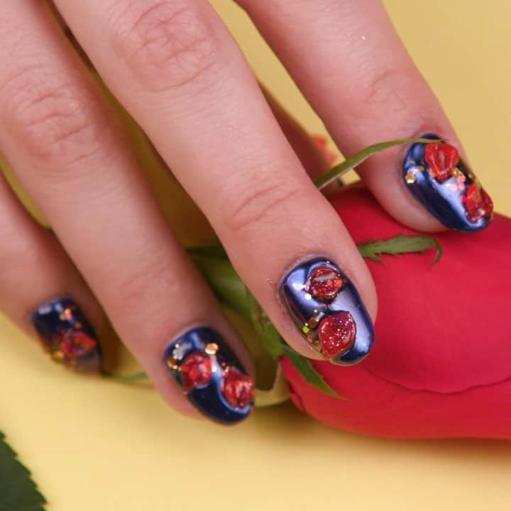 美女と野獣のインスタグラム：「Lumiere did say you must be bold and daring, right? This enchanted nail art is just that! 🌹💅」