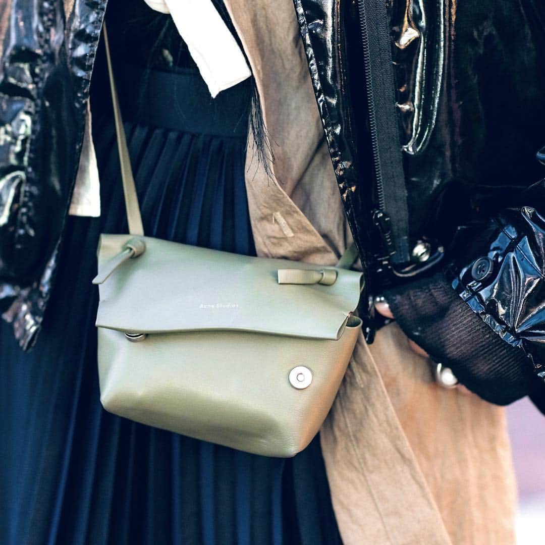 Harajuku Japanさんのインスタグラム写真 - (Harajuku JapanInstagram)「@Kurumi_Otsuka on the street in Harajuku wearing a shiny Phillip Lim cropped jacket over a Chin Mens top, a John Lawrence Sullivan asymmetrical pleated skirt, an Acne Studios bag, MM6 Maison Margiela platform loafers, Maiden Tokyo and Beams accessories.」3月14日 15時36分 - tokyofashion