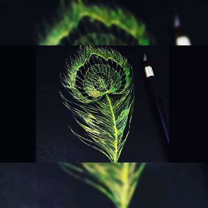 のインスタグラム：「Kirie Glass Feather　 by KIRIKEN Masayo 切り絵作品『ガラスの羽』制作過程動画  こんにちは、切り絵作家の 切り剣 Masayoです。 今回の動画は、中学生の息子がスマートフォンを落としてガラスの画面にヒビが入ってしまいました、そのひび割れがモチーフです。 それがすごく綺麗なひび割れでまるで銃で撃って出来たような綺麗なヒビ割れなのでそれをを切り絵にしてみました。 そしてそれに孔雀の羽のようなデザインを施しフワフワな毛のようなもの付けてみました。紙はキラキラ光るオーロラパールカラー折り紙を使い切り絵にしたものです。 見所は、そのフワフワとした毛のようなものを制作する為に、0.1ミリの幅で切り抜く映像です。その制作過程を見てください。  Paper Cutting Art "Glass feather" Production Movie! Hello, I am paper cutting artist KIRIKEN Masayo. At one time my son dropped the smartphone to the ground and its screen broke. I was inspired by seeing that crack was broken as if it were shot by a gun. Based on the cracks, I imagined the feathers spread lightly like the peacock feathers, and designed it. The paper used aurora pearl color origami that shines glittery. This time it is a movie of works born from such cracks. The highlight is a technique of cutting delicate wing patterns with a width of 0.1 mm.Please watch .............................................................................................. .............................................................................................. ■Please visit the profile link for SHOPPING→@kiriesousakukamasayo ................................................................................................................................................................................................................................#切り絵#アート#美術#紙#工芸#ハンドメイド #美 #超絶技巧 #切り絵アート #ペーパークラフト#綺麗 #世界らん展#スマートフォン  #cutout#papercraft#paperart#handcut#handmade#artwork #delicate#handcutpaper#paperartist#artwork#papercut#strictlypaperart#paperwork#paperdesign#papercutout#cutpaper#cutpaperart」