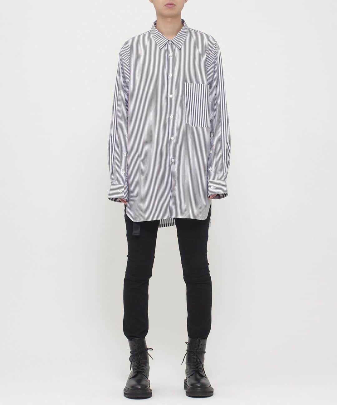 ウィザードのインスタグラム：「2019 Spring/Summer “Humanoise System" Collection  DOCKING STRIPE SHIRTS  52/- × 70/- の糸で織られた平織りの生地に微起毛を施し、肌触り良く柔らかい仕上がりの素材です。 前袖の切り替えが全て釦で開閉可能なギミックはポンチョのような要素やベンチレーションといった用途でも使用可能になっています。  In store now  WIZZARDがオフィシャルで運営しているZOZO TOWNの店舗を5月を持ちまして撤退致します。 今後はWIZZARD直営のオンラインストアにてご覧ください。  https://wizzard.stores.jp  2019 Spring/Summer “Humanoise System “ Collection  Delivery  Start. Offical Web Store  https://wizzard.stores.jp/  2019 S/S COLLECTION ”HUMANOISE SYSTEM” Through the song “LIFT” by Radiohead, can feel some contrast, against and some feeling from close to open. This is all about our collection. Asymmetry, docking, ventilation, graphic and print will provide you the imagination.  #wizzard_fac #wizzard #fashion #tokyofashion  #streetfashion  #fashionphoto  #streetwearbrand  #streetwearaddicted #19ss #radiohead #ウィザード #メンズファッション #ファッション #モード #モード系ファッション」