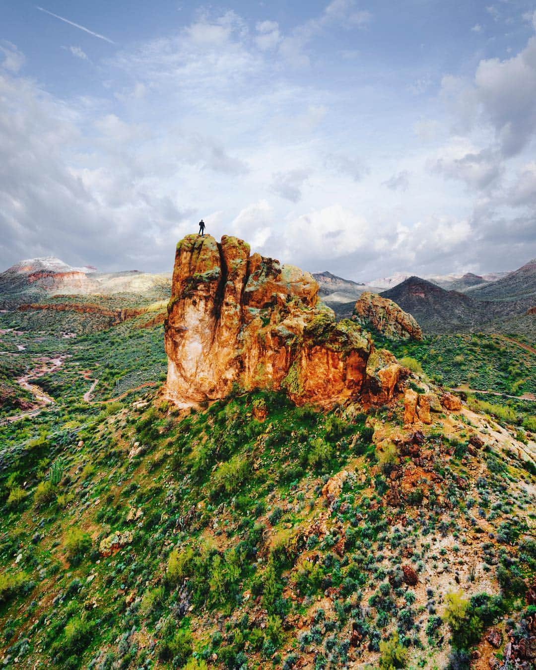 Adam Senatoriのインスタグラム：「Superstition Mountains, Arizona⁣  When I started the day, doubt and resistance set up shop in my dome and started the familiar refrain… “don’t bother, it’s raining, it’s snowing, you haven’t shot anything in 3 days, why would today be any different”… on and on.  Same ol b.s.  I’ve let that internal chatter stop me before, but I’m better able now to swim move around it by leveraging the counter emotions of regret and the sinking feeling of missed opportunity.⁣ In the end, we drove, and drove and stuck it out managing to get what we could which wasn’t much. But at the tail end of the day caught the blue sky. Yeah I never got the “light” I was looking for but I don’t have regret.  I love going to far away places, places I know I’ll never return to and stand on again. Super powerful feeling and keeps you in the moment when you’re out there.  Free to roam. Far from home.  #amazingdestination⁣ #alwaysgo⁣ #beautifuldestinations⁣ #discoverearth #explorearizona⁣ #forgeyourownpath⁣⁣ #getlost⁣ #getoutstayout⁣ #keepitwild⁣ ⁣ #nomadstories⁣ ⁣ #roamtheplanet⁣ #takemoreadventures #tourtheplanet⁣ #travelarizona #travelandlife⁣ #travelstoke⁣ #traveldiary⁣ #voyaged #westbysouthwest⁣ #wondermore⁣ #wonderful_places⁣ #wildernessnation」