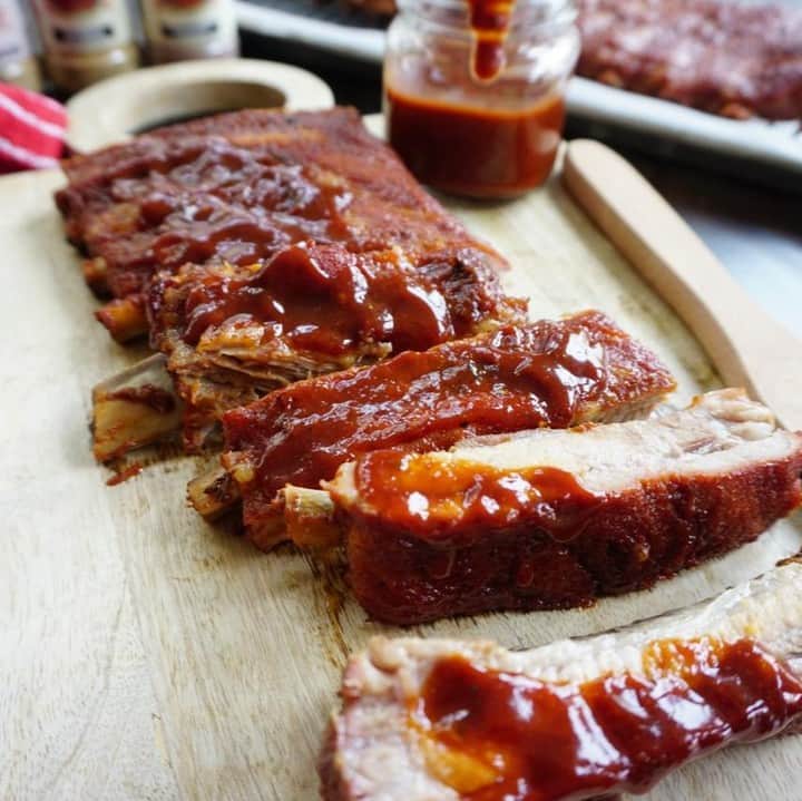 Flavorgod Seasoningsさんのインスタグラム写真 - (Flavorgod SeasoningsInstagram)「Baked HOT BBQ Ribs 🌶🌶🌶⁣ .⁣ Made with:⁣ 👉 #flavorgod Ghost ⁣ 👉 #flavorgod Garlic Lovers⁣ 👉 #flavorgod Pink Salt & Pepper⁣ -⁣ On Sale here ⬇️⁣ Click the link in the bio -> @flavorgod⁣ www.flavorgod.com⁣ -⁣ Ingredients:⁣ 6 lbs. Pork Ribs, two racks⁣ 1 1/2 teaspoon Flavorgod S+P⁣ 1 tablespoon Flavorgod Garlic Lover’s⁣ ⁣ BBQ Sauce Ingredients:⁣ 1 teaspoon Flavorgod S+P⁣ 1 tablespoon Flavorgod Ghost⁣ 3 tablespoons Worcestershire sauce⁣ 1 cup organic ketchup⁣ 2 tablespoons Flavorgod Chocolate Donut⁣ 1 lime freshly squeezed⁣ 2 tablespoons honey⁣ ¼ cup organic brown sugar⁣ 3 tablespoons extra virgin olive oil⁣ -⁣ Directions:⁣ Preheat oven to 350F.⁣ ⁣ Add all sauce ingredients in a medium bowl. Whisk all ingredients until well incorporated. Set aside.⁣ ⁣ Place ribs in a large flat pan lined with foil. Season with Flavorgod S+P and Flavorgod Garlic Lover’s.⁣ ⁣ Roast in oven for 1 hour and 15 minutes. Remove from oven, baste ribs with BBQ sauce, cover with foil and bake for an additional 45 minutes or until ribs are tender, basting occasionally.⁣ -⁣ Flavor God Seasonings are:⁣ 💥ZERO CALORIES PER SERVING⁣ 🌿 Made Fresh⁣ 🔥 KETO & PALEO⁣ 🌱 GLUTEN FREE & KOSHER⁣ ☀️ VEGAN FRIENDLY ⁣ 🌊 Low salt⁣ ⏰Shelf life is 24 months⁣ -⁣ -⁣ #food #foodie #flavorgod #seasonings #glutenfree #paleo ⁣ #foodporn #mealprep #kosher ⁣ ⁣」4月8日 10時00分 - flavorgod