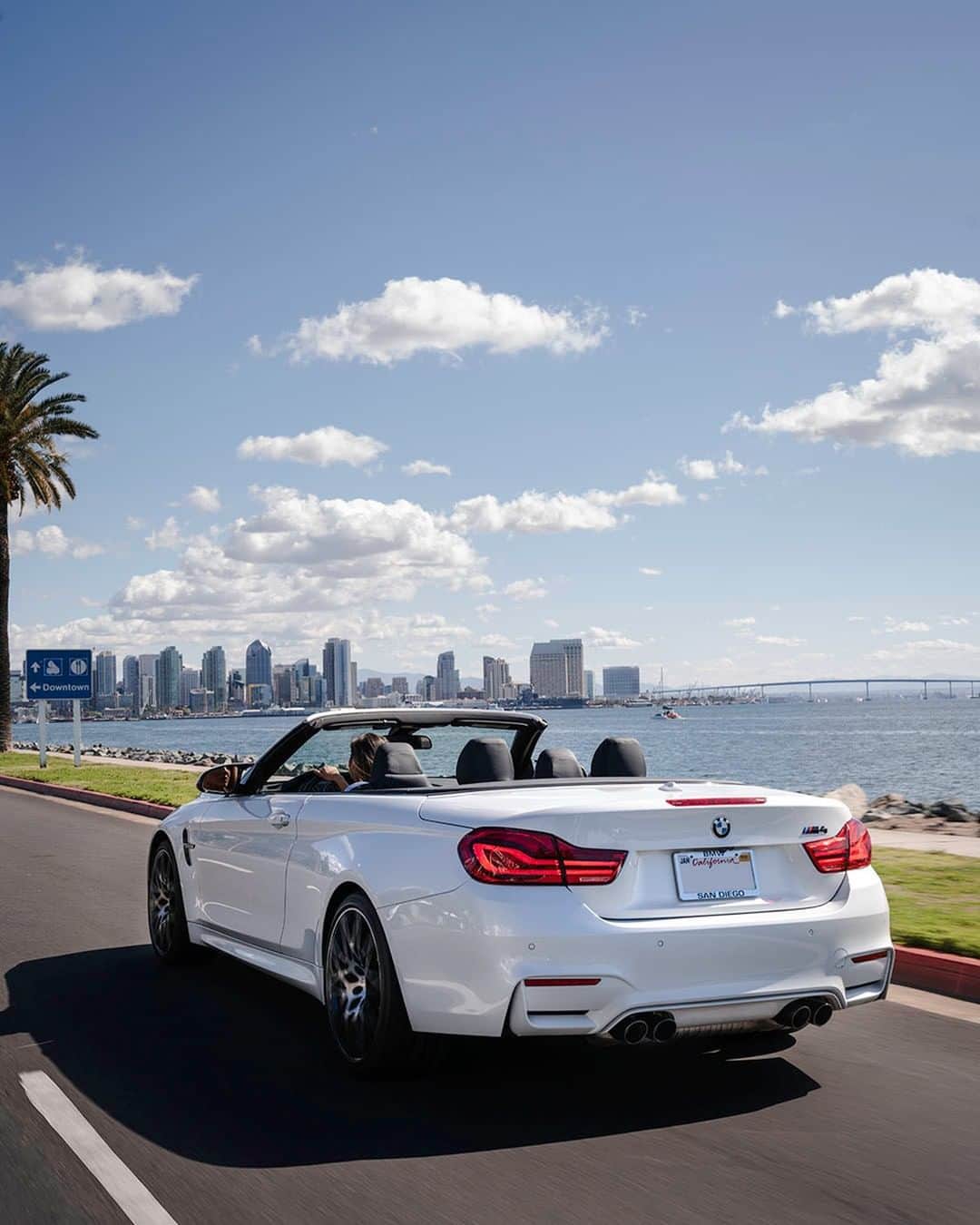 BMWのインスタグラム：「No better way to travel.  The BMW M4 Convertible. #BMWrepost @pacificexoticsrental @jeffvedenoff #BMW #M4 #BMWM __ BMW M4 Convertible: Fuel consumption in l/100 km (combined): 10.2 - 10.1 (9.6 - 9.5), CO2 emissions in g/km (combined): 233 - 230 (218 - 215). The figures in brackets refer to the vehicle with seven-speed M double-clutch transmission with Drivelogic. The values of fuel consumptions, CO2 emissions and energy consumptions shown were determined according to the European Regulation (EC) 715/2007 in the version applicable at the time of type approval. The figures refer to a vehicle with basic configuration in Germany and the range shown considers optional equipment and the different size of wheels and tires available on the selected model. The values of the vehicles are already based on the new WLTP regulation and are translated back into NEDC-equivalent values in order to ensure the comparison between the vehicles. [With respect to these vehicles, for vehicle related taxes or other duties based (at least inter alia) on CO2-emissions the CO2 values may differ to the values stated here.] The values of the vehicles are preliminary. The CO2 efficiency specifications are determined according to Directive 1999/94/EC and the European Regulation in its current version applicable. The values shown are based on the fuel consumption, CO2 values and energy consumptions according to the NEDC cycle for the classification. For further information about the official fuel consumption and the specific CO2 emission of new passenger cars can be taken out of the „handbook of fuel consumption, the CO2 emission and power consumption of new passenger cars“, which is available at all selling points and at https://www.dat.de/angebote/verlagsprodukte/leitfaden-kraftstoffverbrauch.html.」