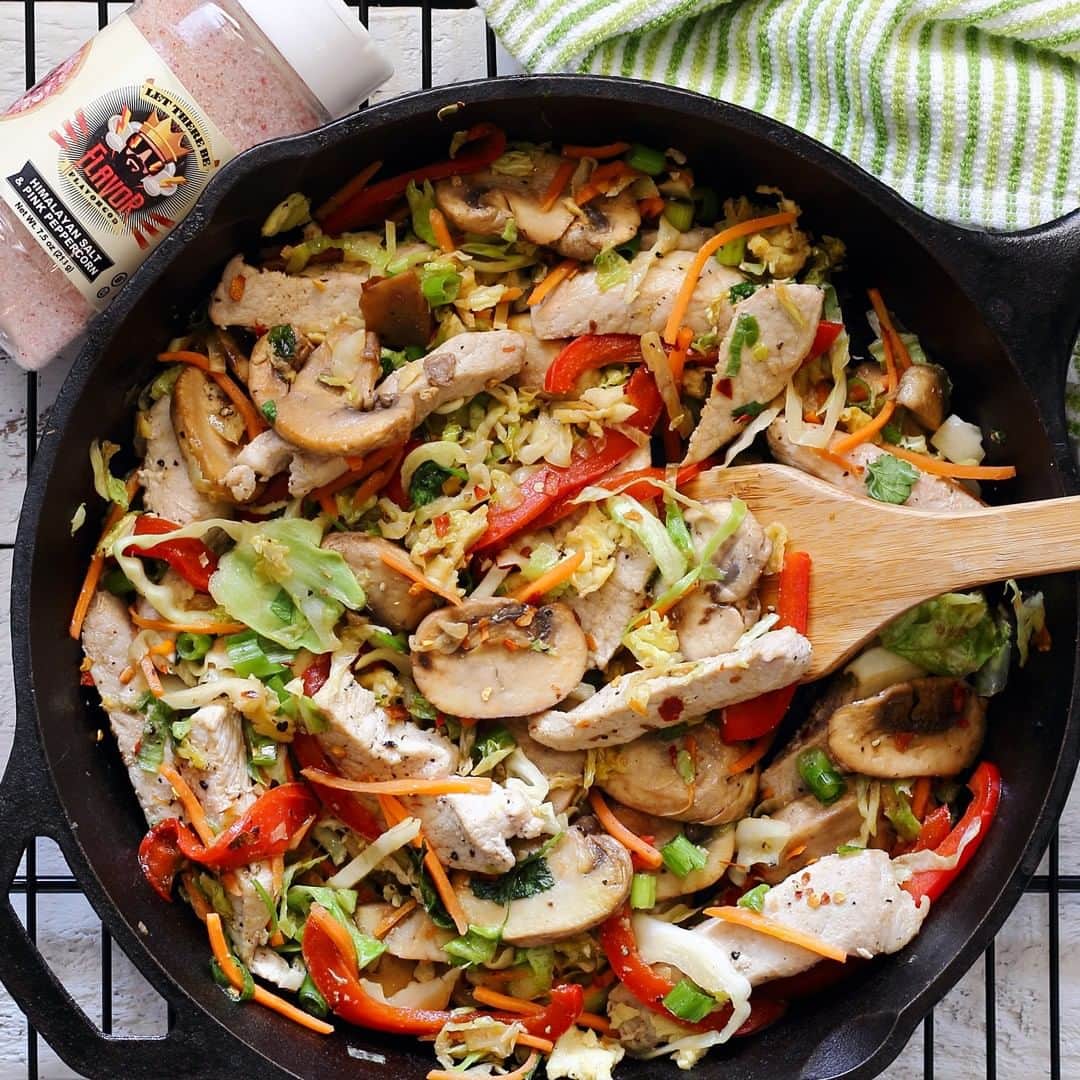 Flavorgod Seasoningsさんのインスタグラム写真 - (Flavorgod SeasoningsInstagram)「QUICK PORK & CABBAGE STIR-FRY🍲🍲⁣ .⁣ Simple one-skillet Asian dish loaded with good stuff and great flavors. Features @flavorgod HIMALAYAN SALT & PINK PEPPERCORN.⁣ ⁣ *From @paleo_newbie_recipes:⁣ ⁣ INGREDIENTS:⁣ ⁣ 2 eggs⁣ 3 tsp sesame oil – divided ⁣ 3/4 pound boneless pork loin chops⁣ 8 ounces sliced mushrooms⁣ 1/2 bell pepper, seeded and sliced⁣ 4 scallions, sliced⁣ 4 cups pre-packaged Asian slaw mix⁣ 2 Tbsp coconut aminos (a soy sauce substitute)⁣ 1/2 tsp ground ginger⁣ 1/4 tsp crushed red peppers (adjust for more or less heat)⁣ Flavor God HIMALAYAN SALT & PINK PEPPERCORN, to taste⁣ ⁣ ⁣ INSTRUCTIONS:⁣ ⁣ First cut pork into thin strips, then slice the bell pepper and onions. Set aside.⁣ --⁣ Whisk 1 teaspoon of sesame oil in with the 2 eggs. Heat egg mixture over medium high in a large skillet and scramble. Remove eggs from skillet and set aside.⁣ --⁣ In same skillet, add 2 teaspoons of olive oil, and 1 teaspoon of sesame oil. Add pork strips and season with Flavor God HIMALAYAN SALT & PINK PEPPERCORN as desired. Cook pork just until pink – about 3 minutes. Remove pork from skillet and set aside.⁣ --⁣ In the empty skillet, heat a little olive oil to medium high. Add mushrooms, season with Flavor God HIMALAYAN SALT & PINK PEPPERCORN as desired, and sauté 3-4 minutes. ⁣ --⁣ Next add the scallions and cabbage to the cooked mushrooms – stir just until cabbage is slightly wilted, about 1 minute. Serve immediately and enjoy!」4月4日 10時00分 - flavorgod